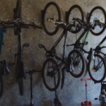 a few bicycles standing in row