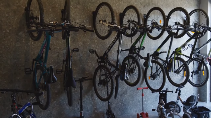 a few bicycles standing in row